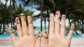 Close up of hands and fingers with smiley faces Royalty Free Stock Photo