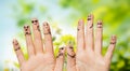 Close up of hands and fingers with smiley faces Royalty Free Stock Photo