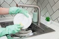 Hand Washing Dishes in Kitchen Sink Royalty Free Stock Photo