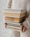 close up hands holding books stack. High quality photo