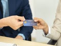 Close-up hands holding a credit card Royalty Free Stock Photo