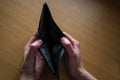 Close up hands holding empty black wallet Royalty Free Stock Photo