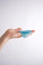 Slime glue a toy for children mucus and liquid flowing on hand