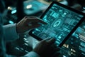 Close-up of hands interacting with a futuristic holographic interface displaying complex data and circular diagrams on a tablet Royalty Free Stock Photo