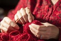 Close-up of hands knitting