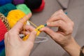 Close-up of hands knitting