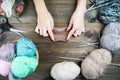 Close-up of hands knitting. Colorful threads. Selection of colorful yarn wool. Knitting background. Knitting yarn for