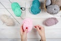 Close-up of hands knitting. Colorful threads. Selection of colorful yarn wool. Knitting background. Knitting yarn for