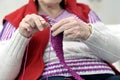 Close-up on hands of knitting senior woman Royalty Free Stock Photo