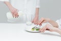 Close up of hands during lunch at the table Royalty Free Stock Photo