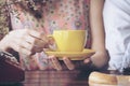 Close up hands of man sitting office desk holding sweet coffee cup relax and enjoy with happy time. Hot coffee mug in hand. Man ho Royalty Free Stock Photo