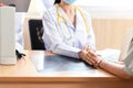 Close up hands Medical doctor woman and team held the hand and consoled and comfort Royalty Free Stock Photo