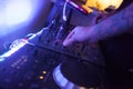 Close up of hands of a music technician working on the studio