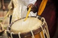 Close up of Hands performing Indian art form Chanda or chande cylindrical percussion drums playing during ceremony