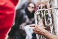 Close up on the hands of a person playing the trumpet Royalty Free Stock Photo