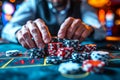 A close-up of the hands of a player at the table making a bet with playing chips. A poker game Royalty Free Stock Photo