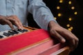 Close up of Hands playing Harmonium an Indian classical music instrument. Royalty Free Stock Photo