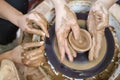 Close-up of Hands of Professional Male Potter Teaching His Female Colleague Royalty Free Stock Photo