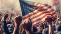 Close-up of hands raised up and holding an American flag