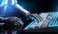 Close up of hands of a robot typing on a keyboard, generative AI at work, data computing