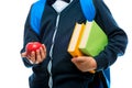 Close-up in the hands of a schoolboy apple