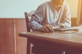 Close up of hands senior man clicking mouse and using computer on table