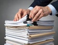 Businessman Organizing and Managing Large Document Files Royalty Free Stock Photo