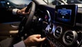 Close up hands on steering wheel. Shallow dof