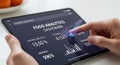 Close up of hands touching a tablet displaying a dark food analytics dashboard with glowing charts and data visualizations for Royalty Free Stock Photo