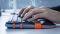 Close-up of hands typing on a computer keyboard with digital data overlay, representing modern technology and connectivity Royalty Free Stock Photo