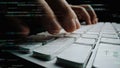 Close-Up of Hands Typing on a Computer Keyboard Surrounded by Glowing Code and Programming Syntax in a Dark Environment Royalty Free Stock Photo