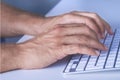 Close up Hands typing on Keyboard