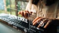 Close-up of hands typing on a keyboard with data visualization graphics depicting data lake concepts. Asymptotic smart Royalty Free Stock Photo