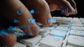 Hands Typing on a Keyboard with Digital Graphs and Data Visualizations Representing Technology, Analytics, and Business Royalty Free Stock Photo