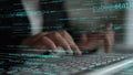 Close-up of Hands Typing on a Laptop with Glowing Code Displays for Programming and Technology Concepts in Dark Royalty Free Stock Photo