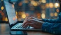 Close up of hands typing on laptop keyboard with an open web browser for productive work Royalty Free Stock Photo