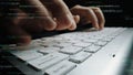 Close-Up of Hands Typing on a Laptop Keyboard Surrounded by Lines of Code in a Dark Environment, Showcasing Technology Royalty Free Stock Photo