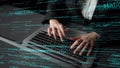 Hands Typing on Laptop with Programming Code Overlay in a Modern Office Setting, Concept of Software Development and Royalty Free Stock Photo