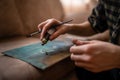 Close up on hands of unknown female artist caucasian woman or girl painting on canvas using brush and colors to make art Royalty Free Stock Photo