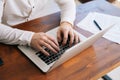 Close-up of hands of unrecognizable Business man is working on laptop computer Royalty Free Stock Photo