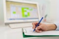 Close-up hands of unrecognizable female doctor general practitioner nurse woman writing treatment prescription medical Royalty Free Stock Photo