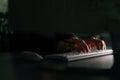 Close-up hands of unrecognizable hacker breaking online web site, engaging hacking into security systems, typing on