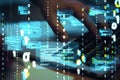 Close up of hands using computer keyboard with abstract coding binary code hologram on blurry background. Artificial intelligence Royalty Free Stock Photo