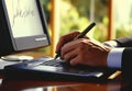 Close Up of Hands Using Stylus on Graphics Tablet in Office Setting Royalty Free Stock Photo