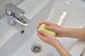 Close up of hands washing with soap. Washing hands with soap under the faucet with water. Clean and hygiene concept Royalty Free Stock Photo