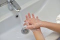 Close up of hands washing with soap. Washing hands with soap under the faucet with water. Clean and hygiene concept Royalty Free Stock Photo