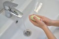 Close up of hands washing with soap. Washing hands with soap under the faucet with water. Clean and hygiene concept Royalty Free Stock Photo