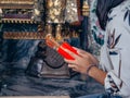 Close up hands woman is shake Chi-Chi Sticks or Seam-Si at Thai temple Royalty Free Stock Photo