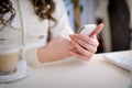 Close up of hands woman using cell phone Royalty Free Stock Photo