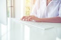 Close up of hands women using computer keyboard on desk in laboratory,Finger typing,Cropped image Royalty Free Stock Photo